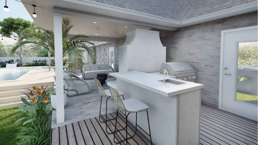 佛罗里达州圣罗莎海滩住宅的部分户外厨房设计，位于室外壁炉后面，包括酒吧座位上的水槽和内置烤架。