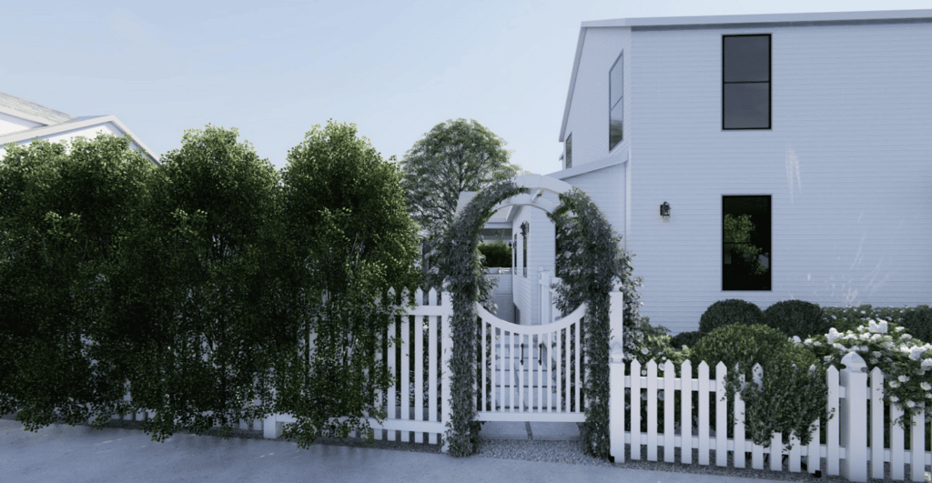 白色的房子，白色的尖桩前院栅栏和凉亭到前面的走道覆盖着藤蔓。